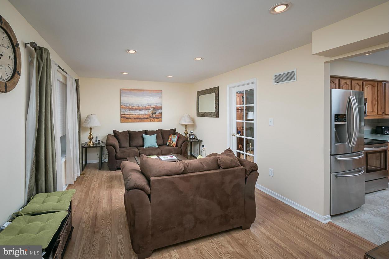 9408 Oak White Road Baltimore, MD 21236 - Photo 8 of 30 a living room with furniture and a flat screen tv