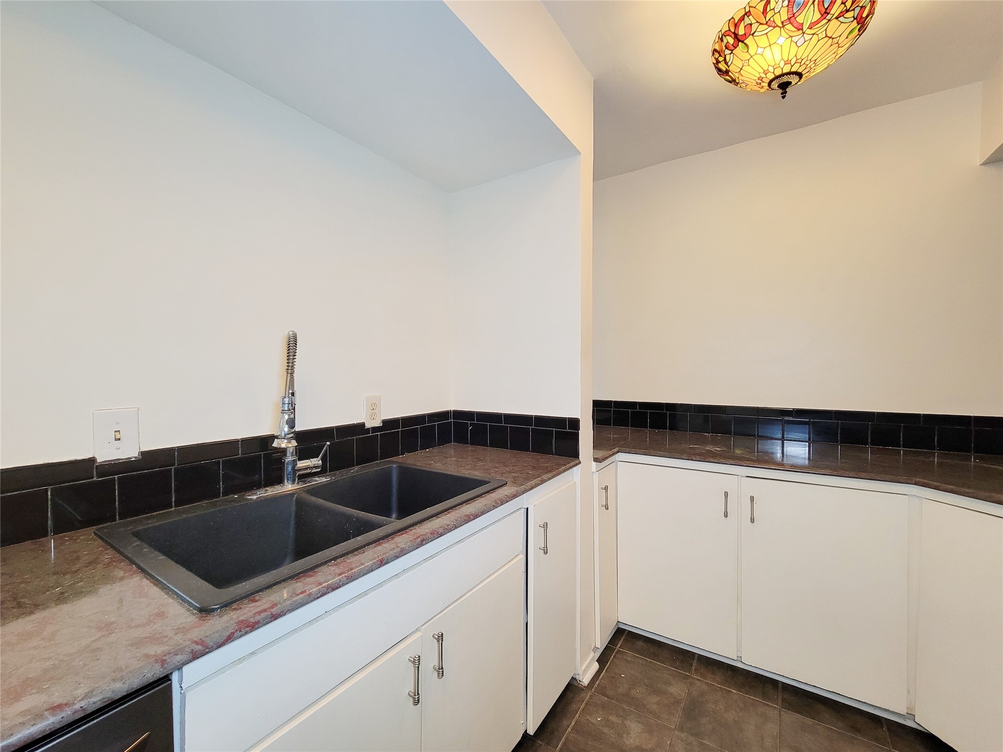 2243 West Alabama Street, Unit B Houston, TX 77098 - Photo 13 of 44 a view white cabinets and sink