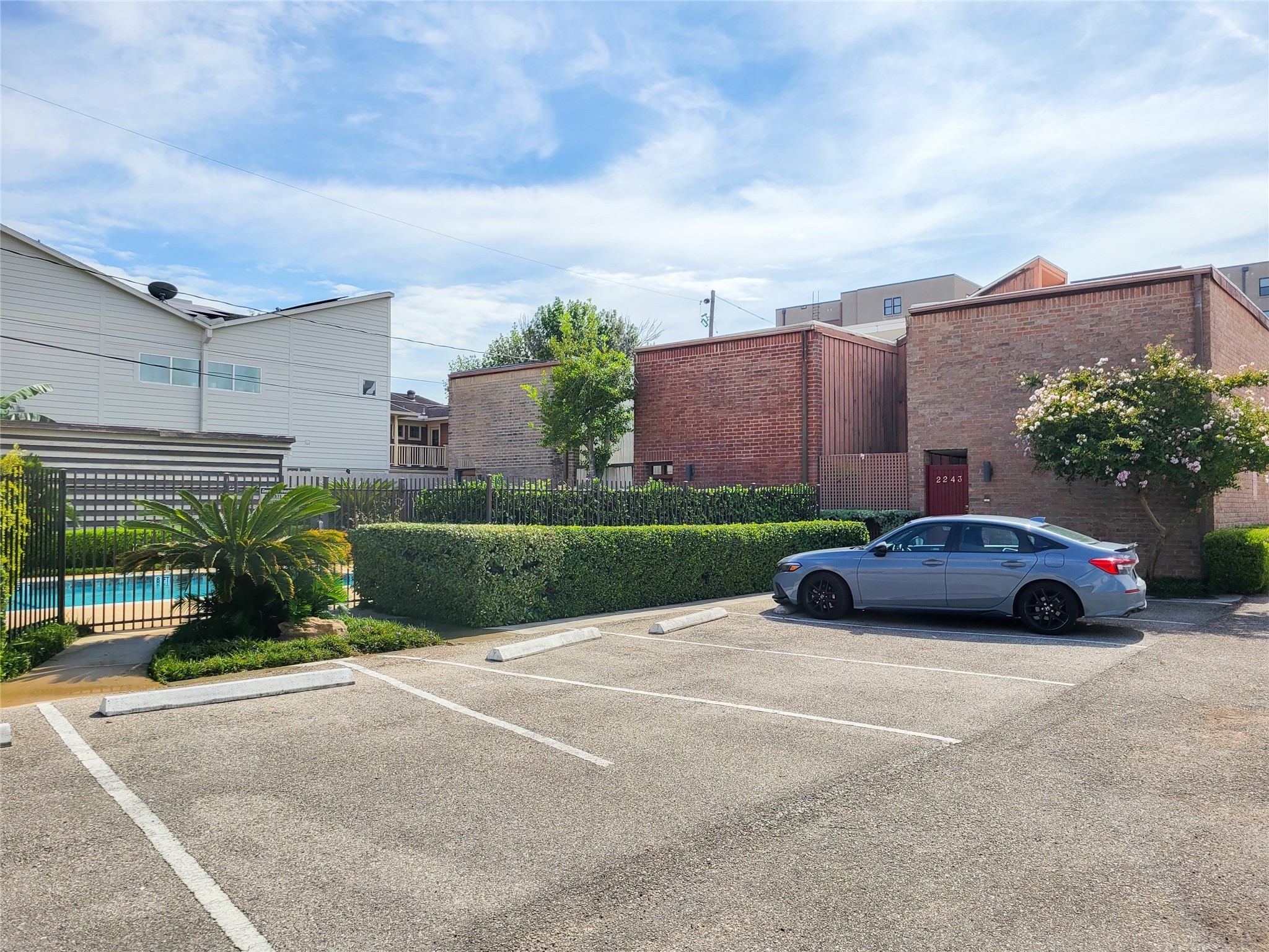 2243 West Alabama Street, Unit B Houston, TX 77098 - Photo 44 of 44 a view of a car parked in front of a house