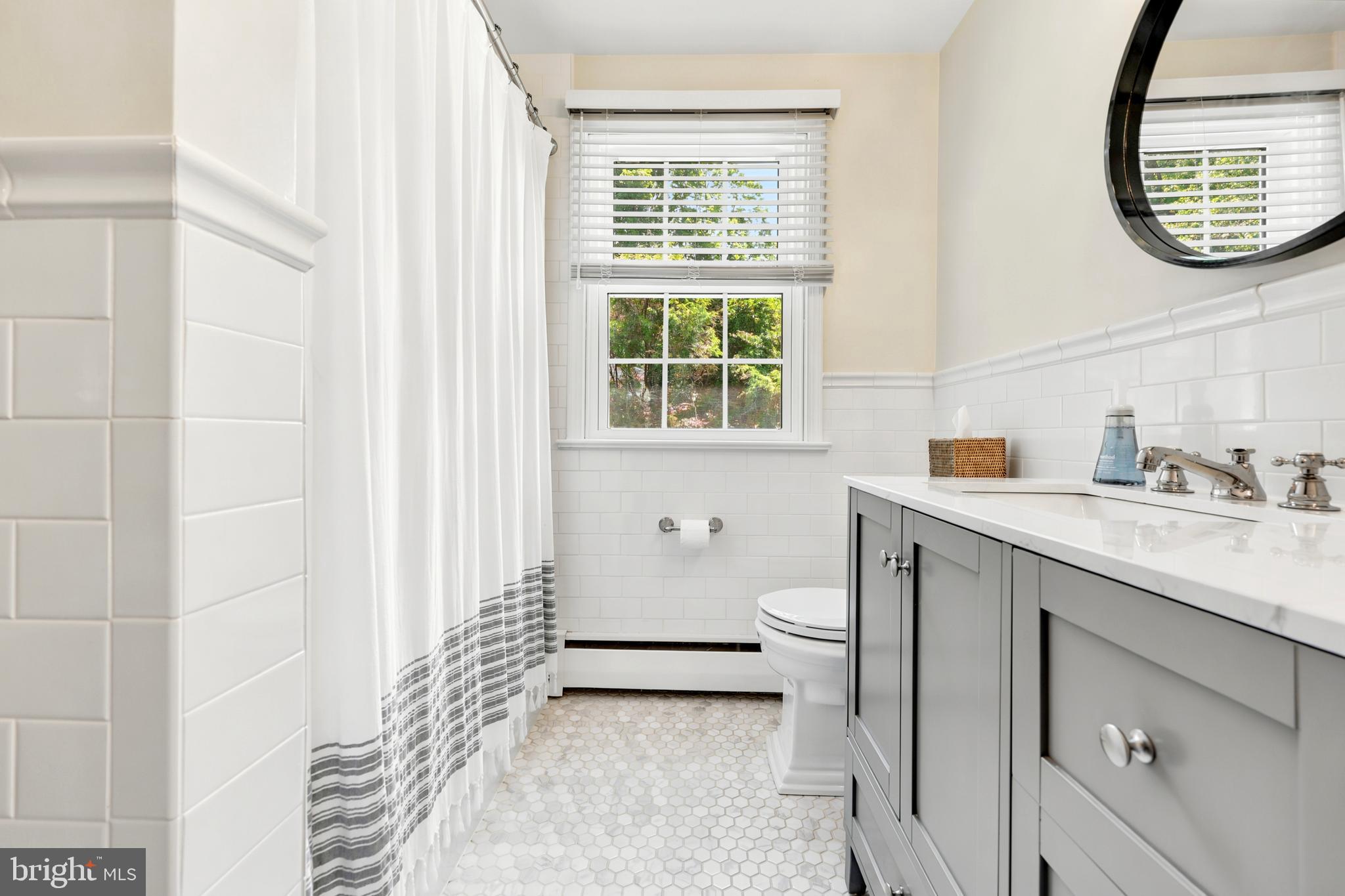 566 Upper Weadley Road Wayne, PA 19087 - Photo 35 of 50 Full Bathroom w/ tub/shower