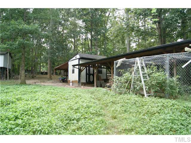 501 Academy Street Raleigh, NC 27603 - Photo 11 of 12 a view of a house with backyard