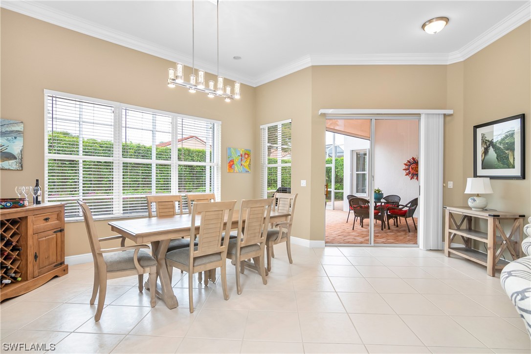 20524 Foxworth Circle Estero, FL 33928 - Photo 11 of 34 a view of a dining room with furniture window and outside view