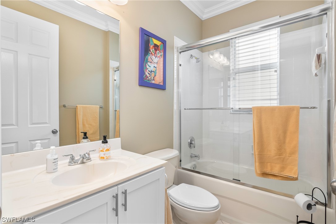 20524 Foxworth Circle Estero, FL 33928 - Photo 25 of 34 a bathroom with a sink a toilet and shower