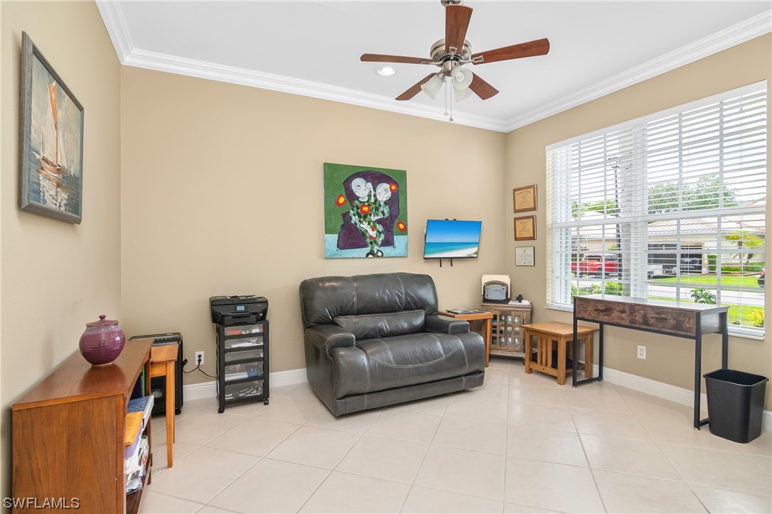 20524 Foxworth Circle Estero, FL 33928 - Photo 26 of 34 a living room with furniture and a window