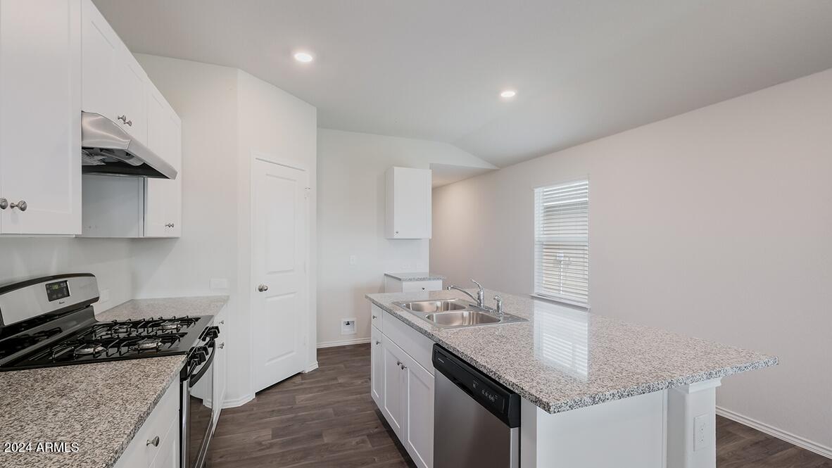 2067 West Solstice Avenue Apache Junction, AZ 85120 - Photo 4 of 12 Amber kitchen and corner pantry