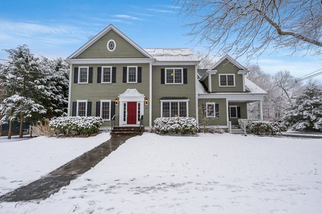 50 Barrett Street Needham, MA 02492 - Photo 1 of 32 a front view of a house with a yard