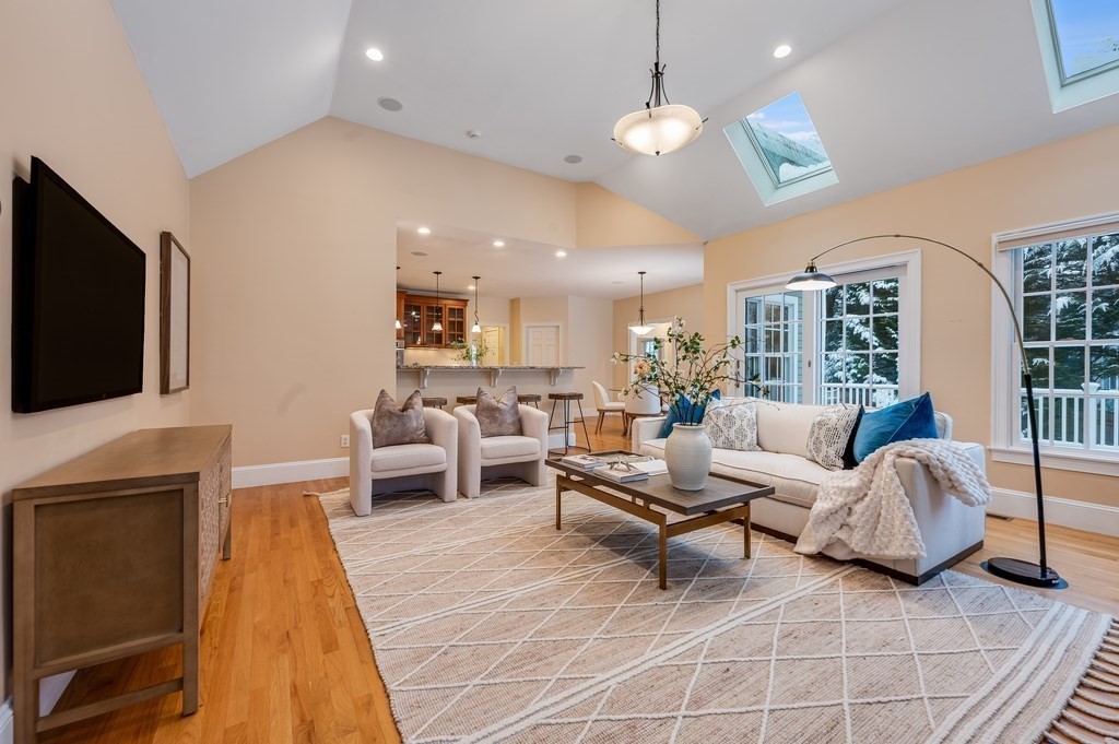 50 Barrett Street Needham, MA 02492 - Photo 12 of 32 a living room with furniture and a flat screen tv