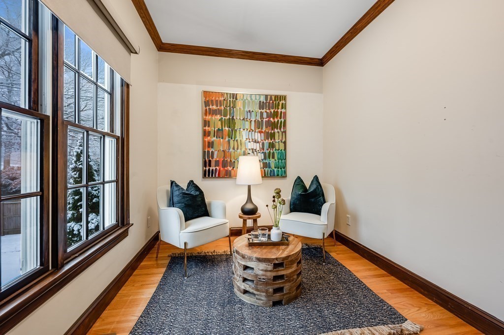 50 Barrett Street Needham, MA 02492 - Photo 13 of 32 a living room with fireplace furniture and a rug