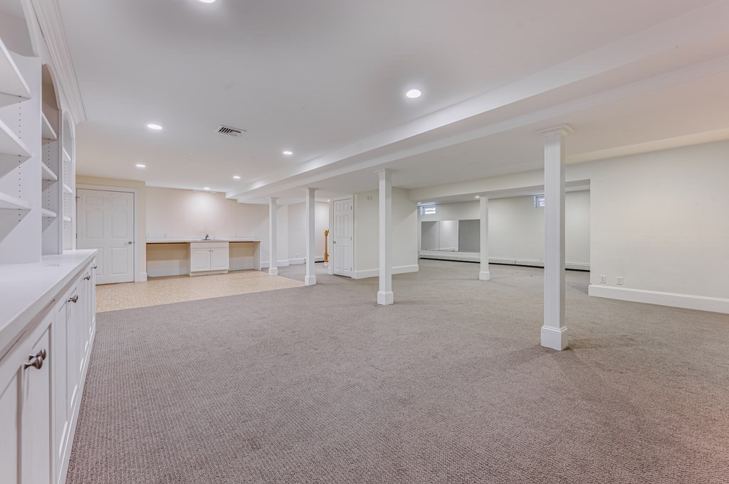 50 Barrett Street Needham, MA 02492 - Photo 26 of 32 a view of a big room with a refrigerator and window