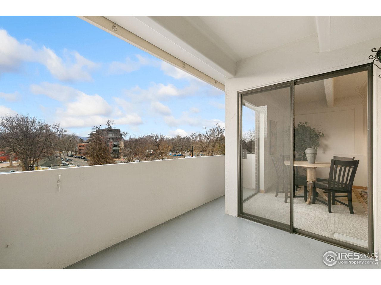 415 South Howes Street, Unit 404 Fort Collins, CO 80521 - Photo 11 of 24 Relax on the balcony!