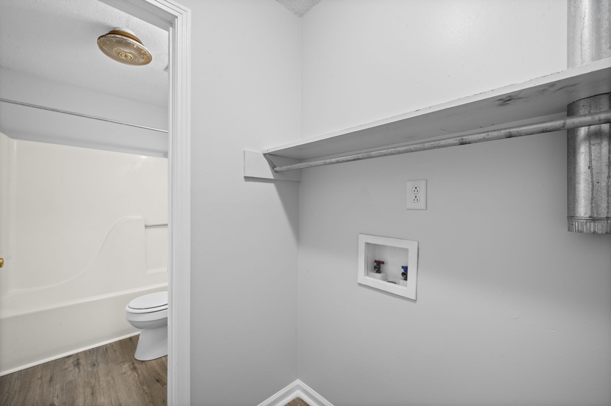 703 Power Street, Unit F Clarksville, TN 37042 - Photo 11 of 13 a view of a hallway with toilet
