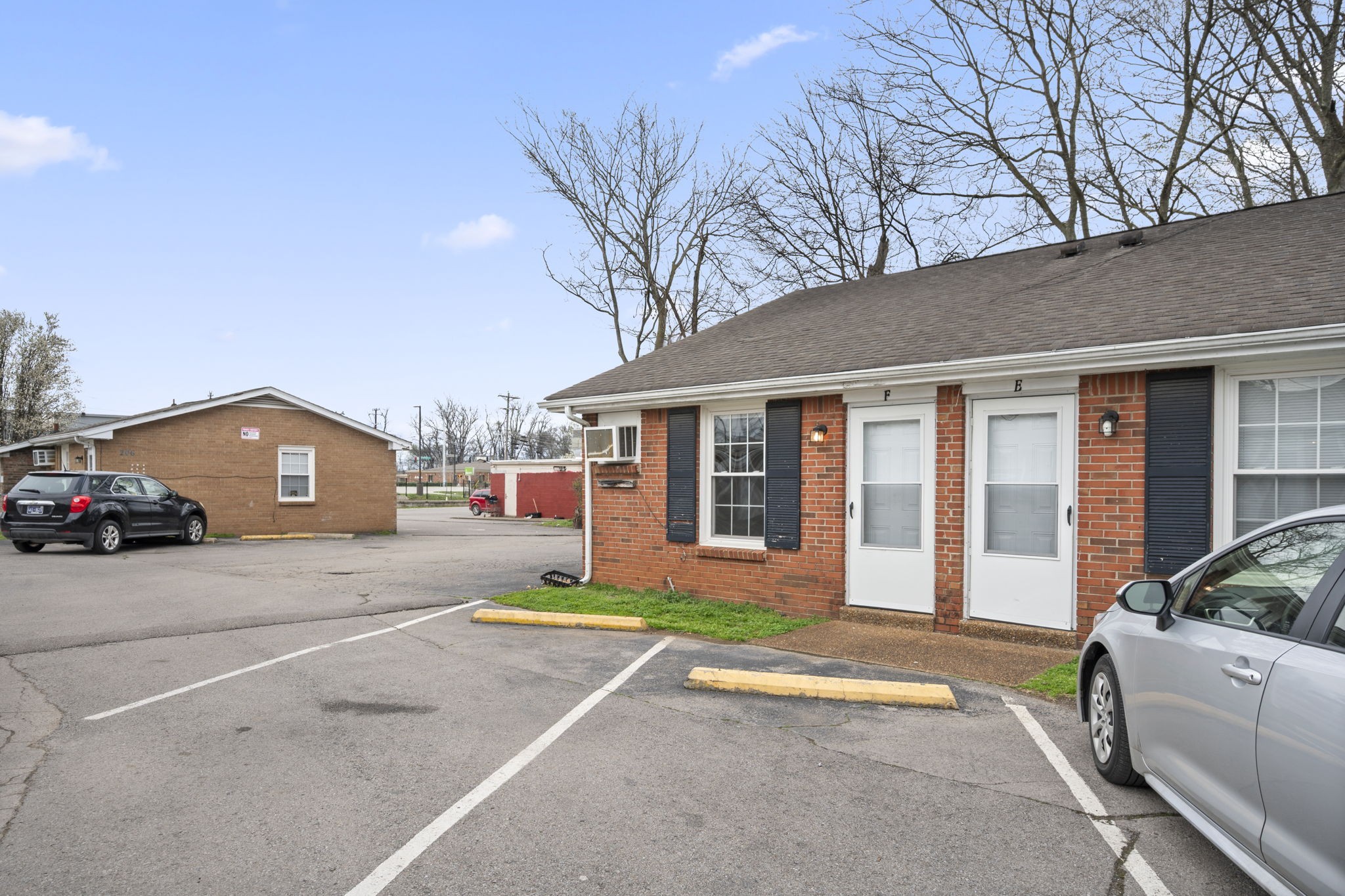 703 Power Street, Unit F Clarksville, TN 37042 - Photo 3 of 13 a house view with a outdoor space