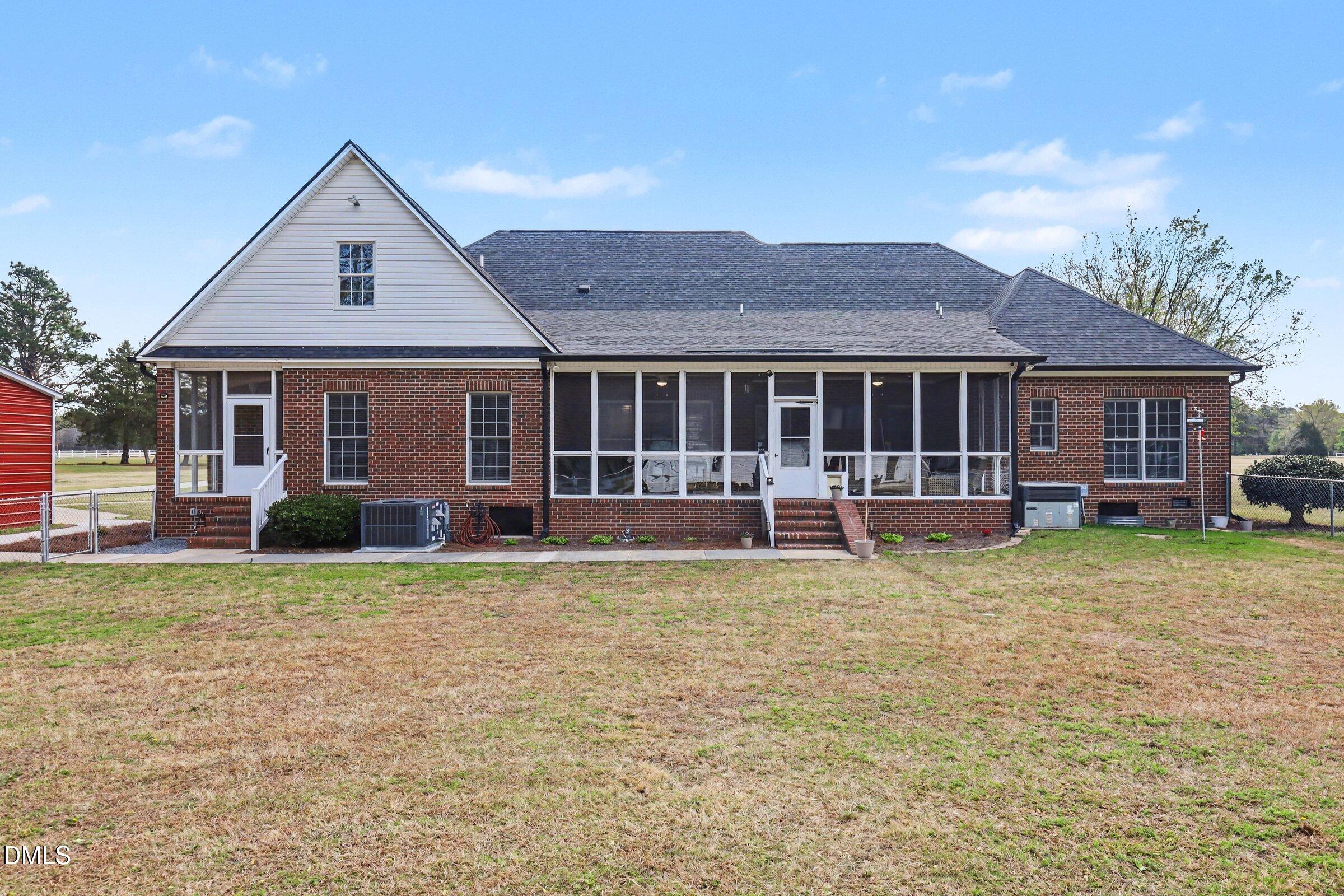 430 Fred Hall Road Stedman, NC 28391 - Photo 30 of 63 a front view of a house with a yard