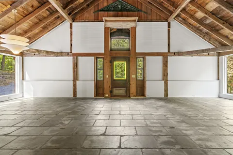 a view of a room with wooden walls