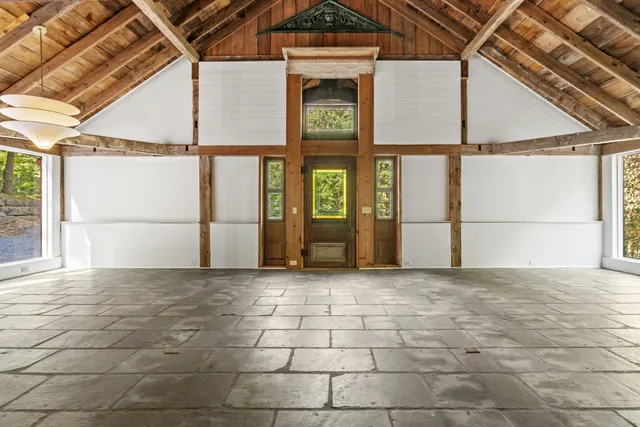 a bathroom with a toilet a sink and a shower