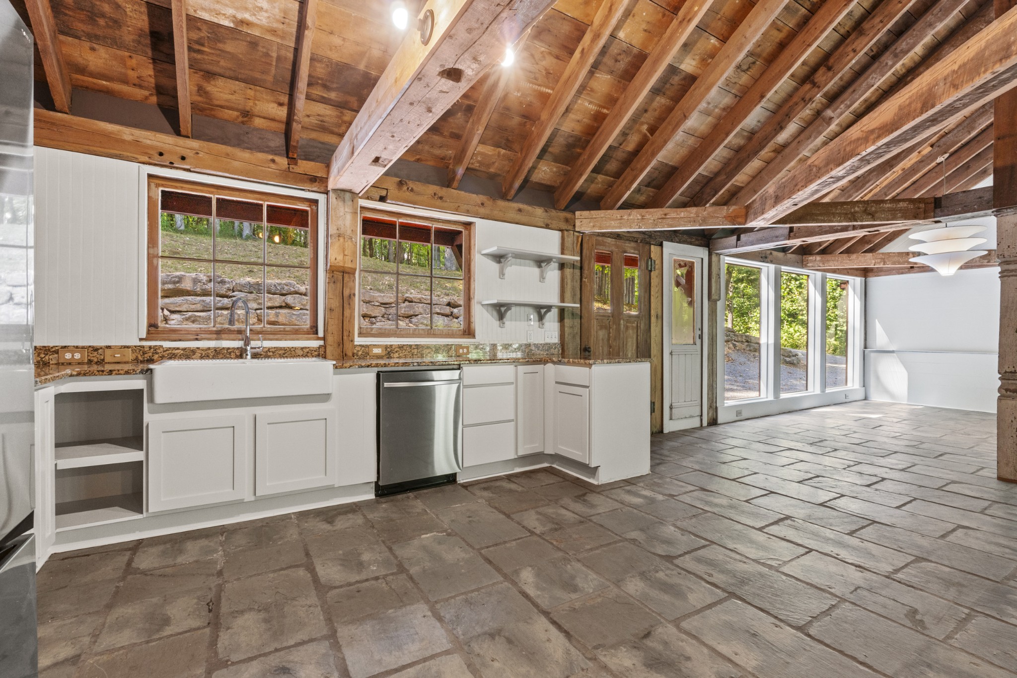 3645 Tyree Springs Road Cottontown, TN 37048 - Photo 16 of 39 a large white kitchen with sink and cabinets