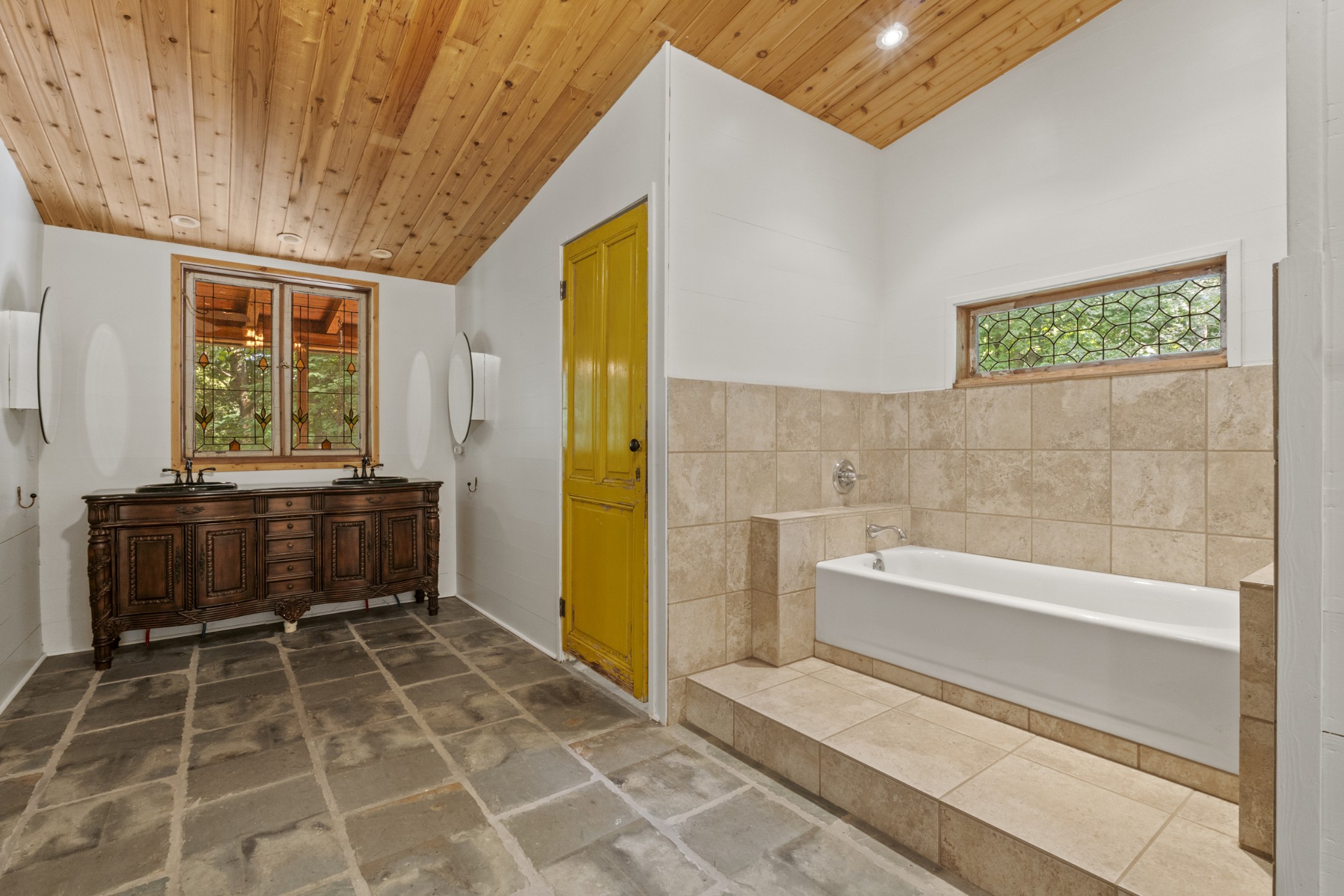 3645 Tyree Springs Road Cottontown, TN 37048 - Photo 21 of 39 a bathroom with a bathtub and a shower