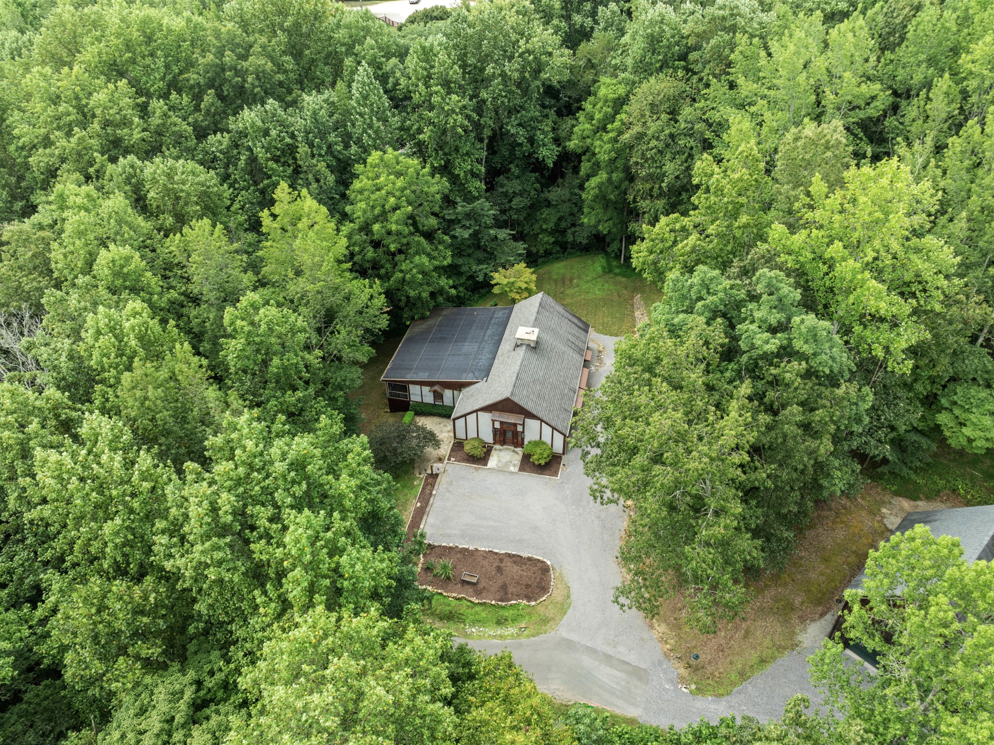 3645 Tyree Springs Road Cottontown, TN 37048 - Photo 4 of 39 an aerial view of a house with yard