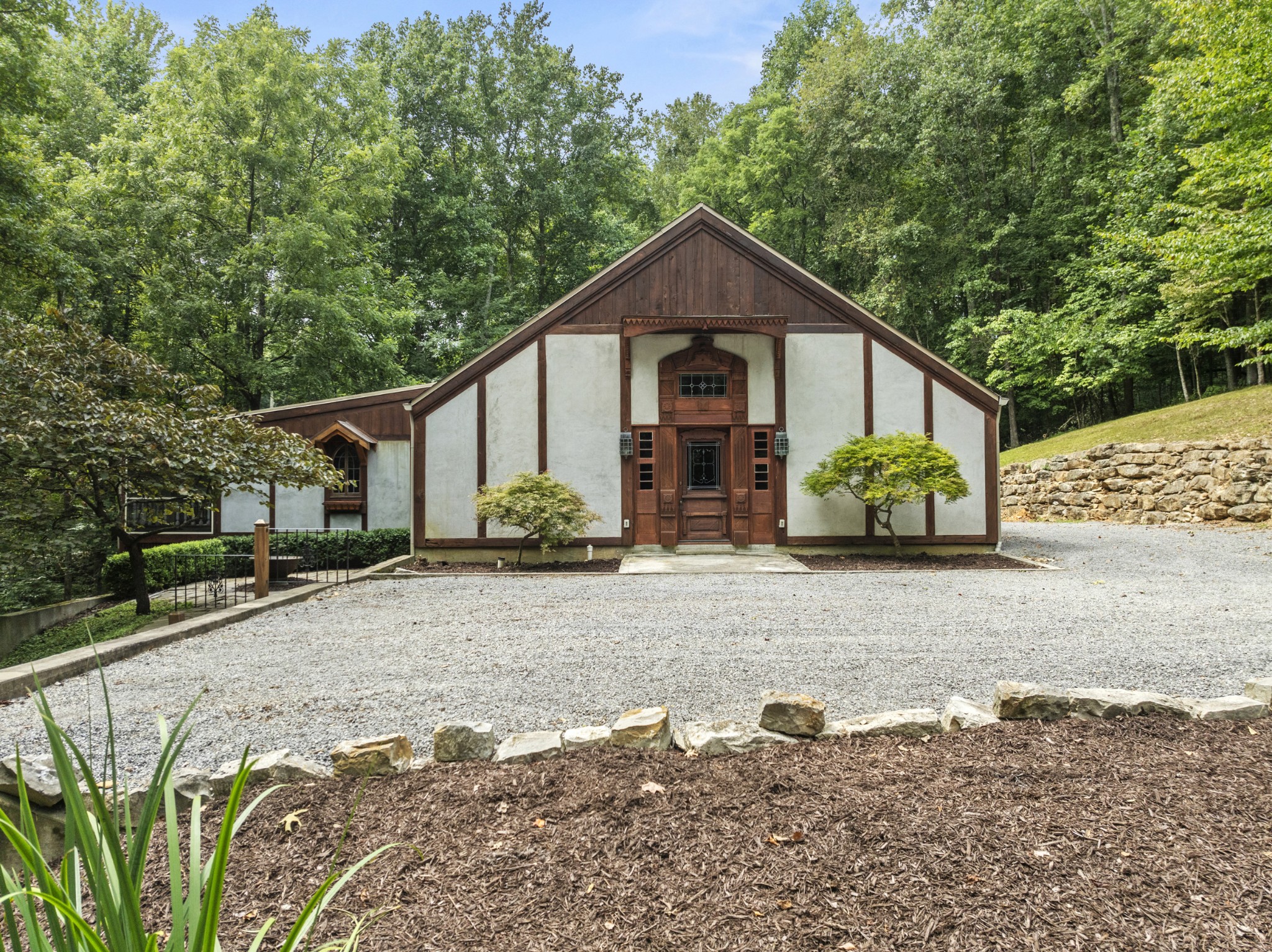 3645 Tyree Springs Road Cottontown, TN 37048 - Photo 5 of 39 a front view of a house with garden
