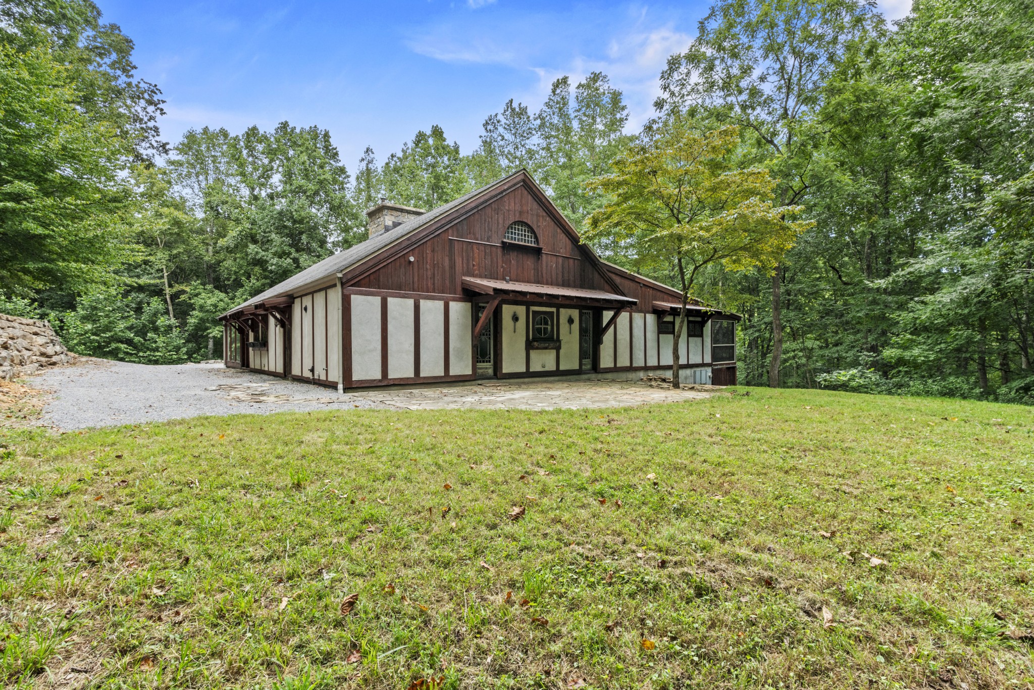 3645 Tyree Springs Road Cottontown, TN 37048 - Photo 6 of 39 a house with trees in the background