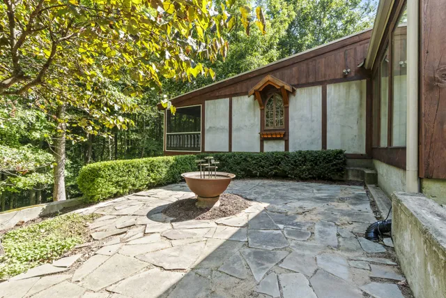 a view of a room with wooden walls