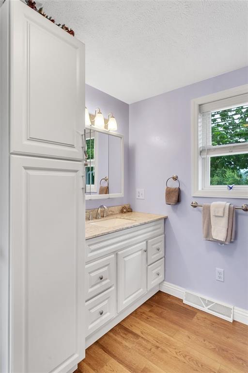 1201 Prospect Road Evans City, PA 16033 - Photo 24 of 45 a bathroom with a sink and a mirror