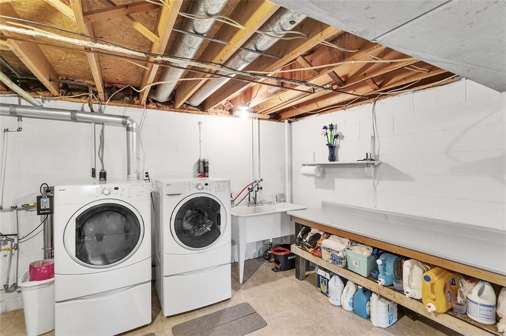 1201 Prospect Road Evans City, PA 16033 - Photo 29 of 45 a utility room with dryer and washer