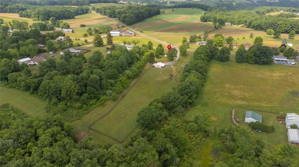 1201 Prospect Road Evans City, PA 16033 - Photo 39 of 45 an aerial view of residential houses with outdoor space and swimming pool