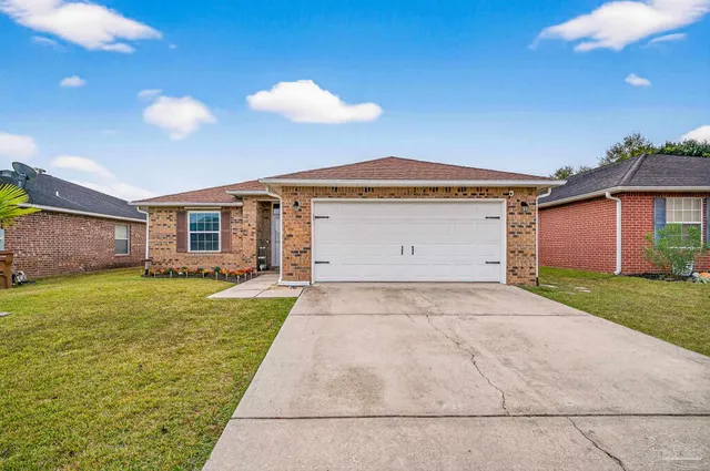 a front view of house with yard