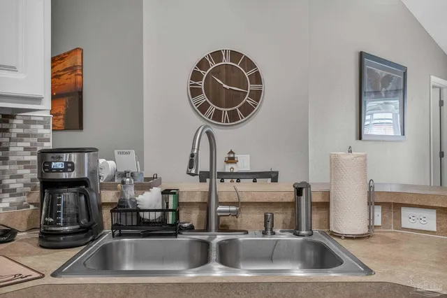a view of kitchen with breakfast area