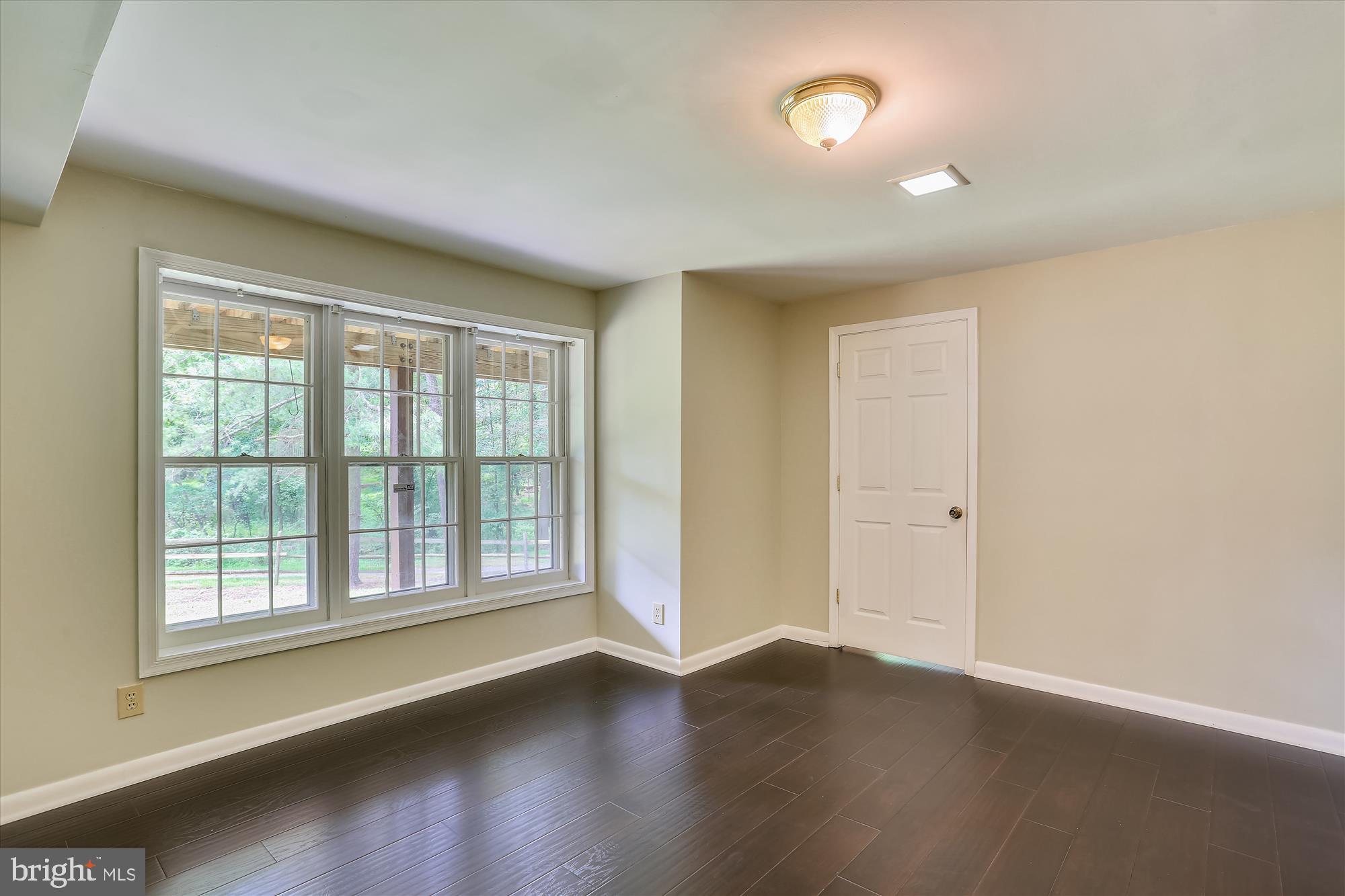 8908 Spring Berry Court Gaithersburg, MD 20886 - Photo 40 of 59 Bedroom 6 with large windows to yard