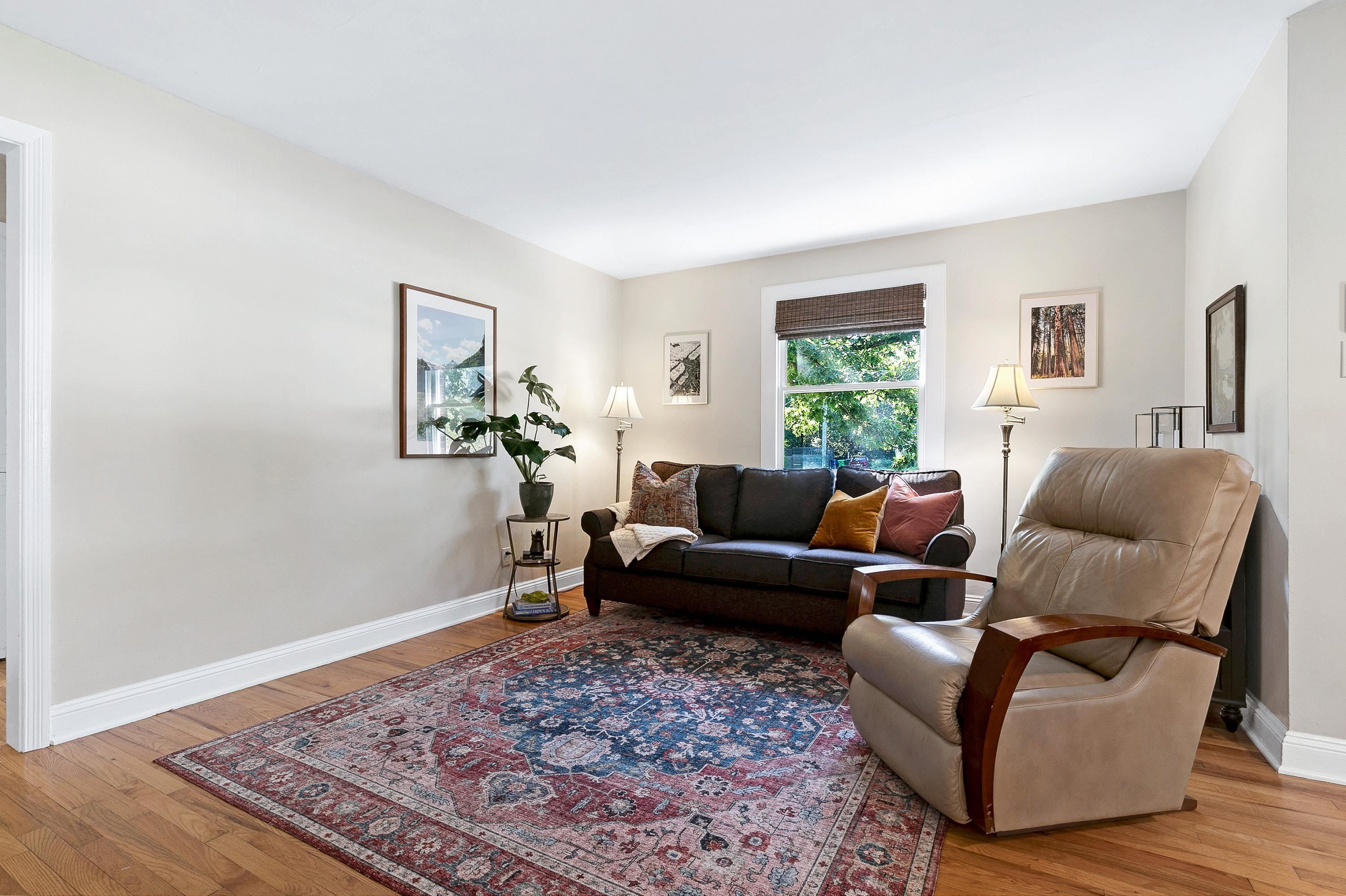 501 North King Charles Road Raleigh, NC 27610 - Photo 11 of 42 a living room with furniture rug and window
