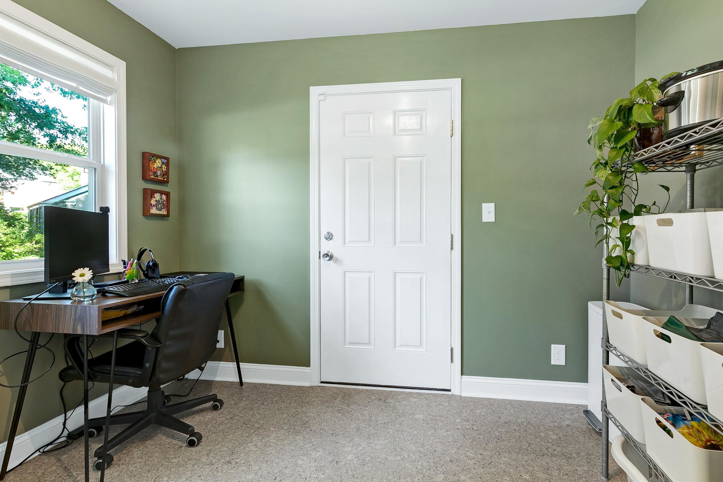 501 North King Charles Road Raleigh, NC 27610 - Photo 20 of 42 a view of a workspace with furniture and a window
