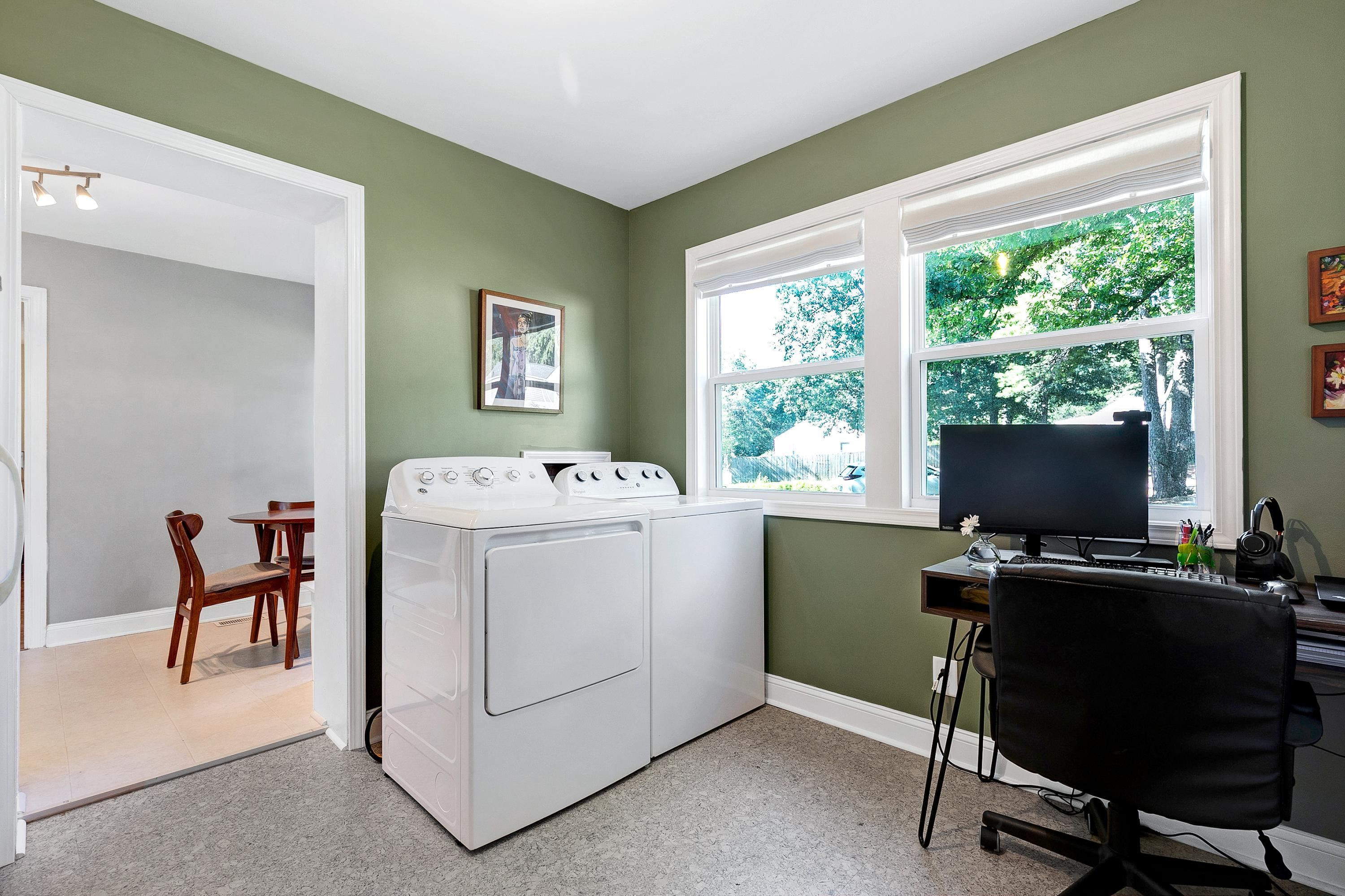 501 North King Charles Road Raleigh, NC 27610 - Photo 21 of 42 a view of a workspace with furniture and a window