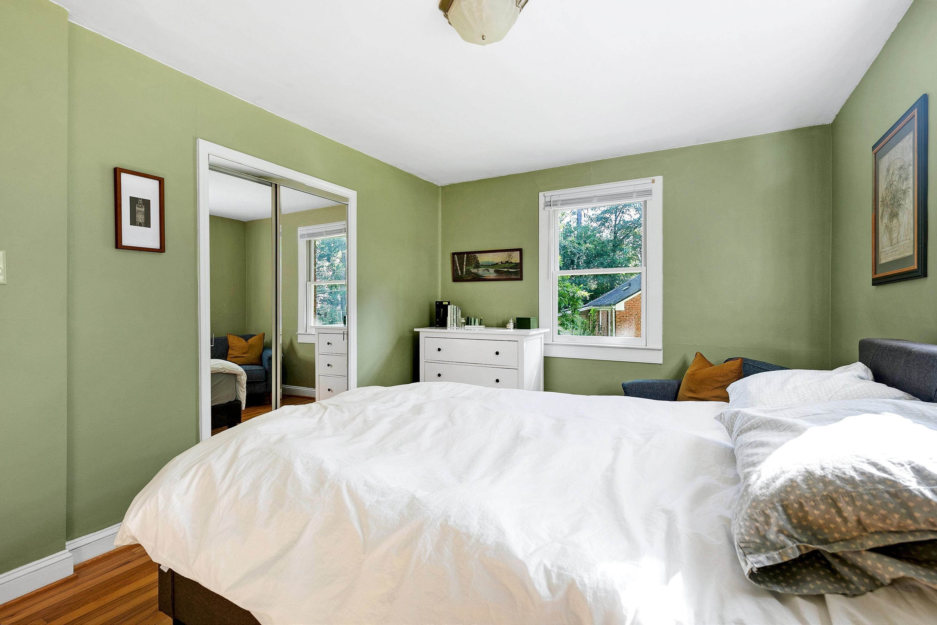 501 North King Charles Road Raleigh, NC 27610 - Photo 23 of 42 a bedroom with a bed and a window