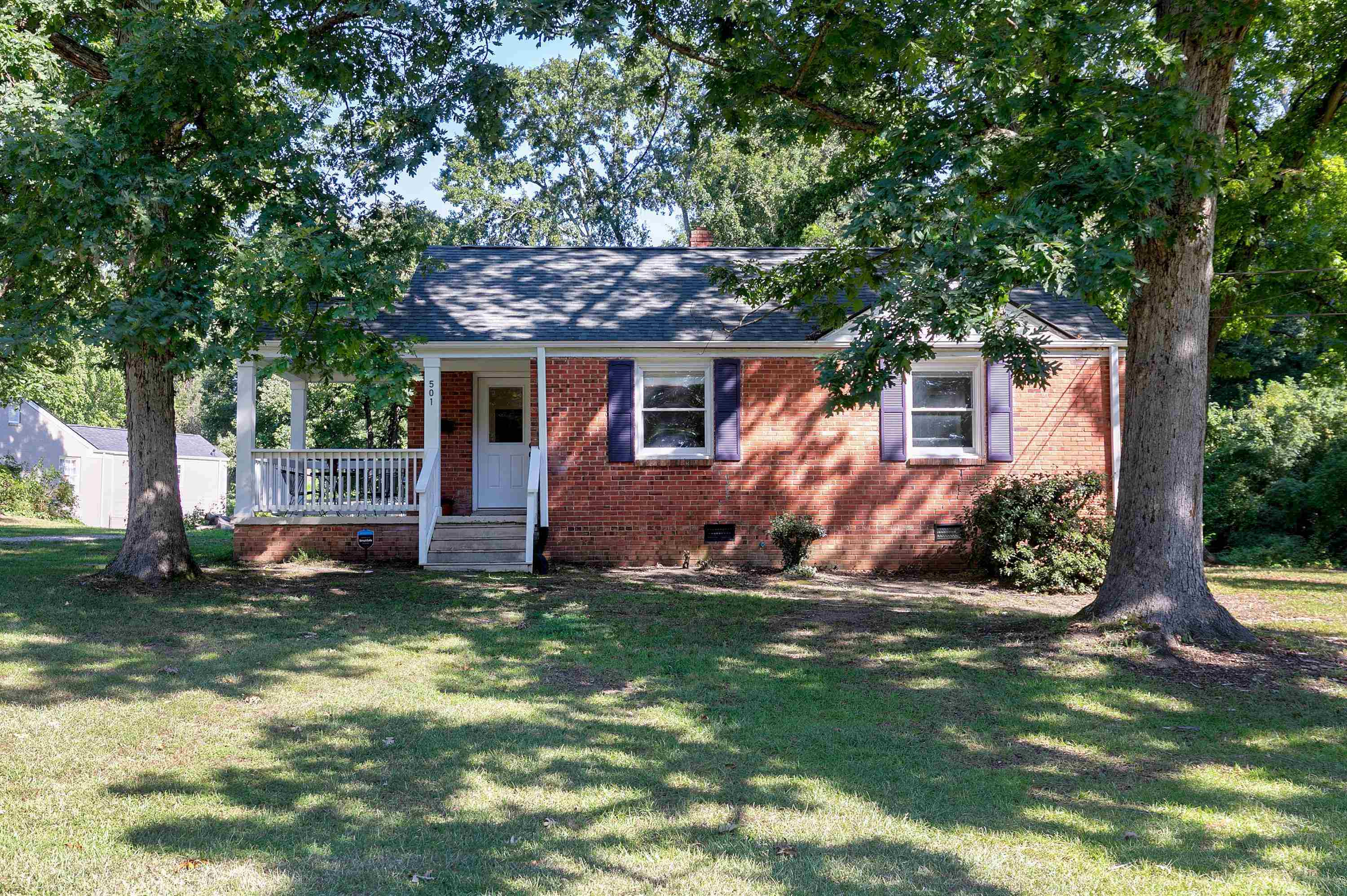 501 North King Charles Road Raleigh, NC 27610 - Photo 26 of 42 a front view of a house with a yard