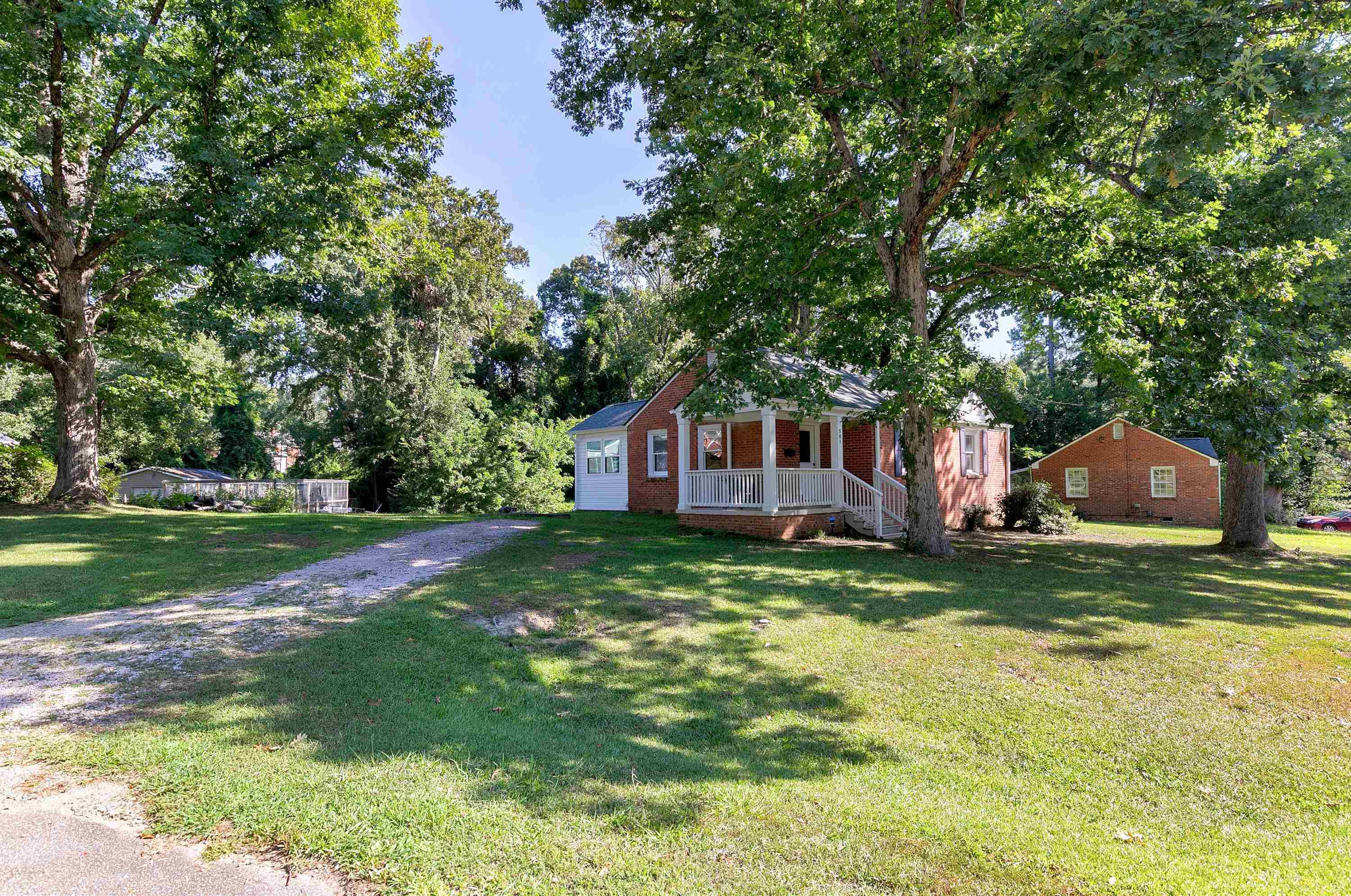 501 North King Charles Road Raleigh, NC 27610 - Photo 33 of 42 a front view of a house with a yard