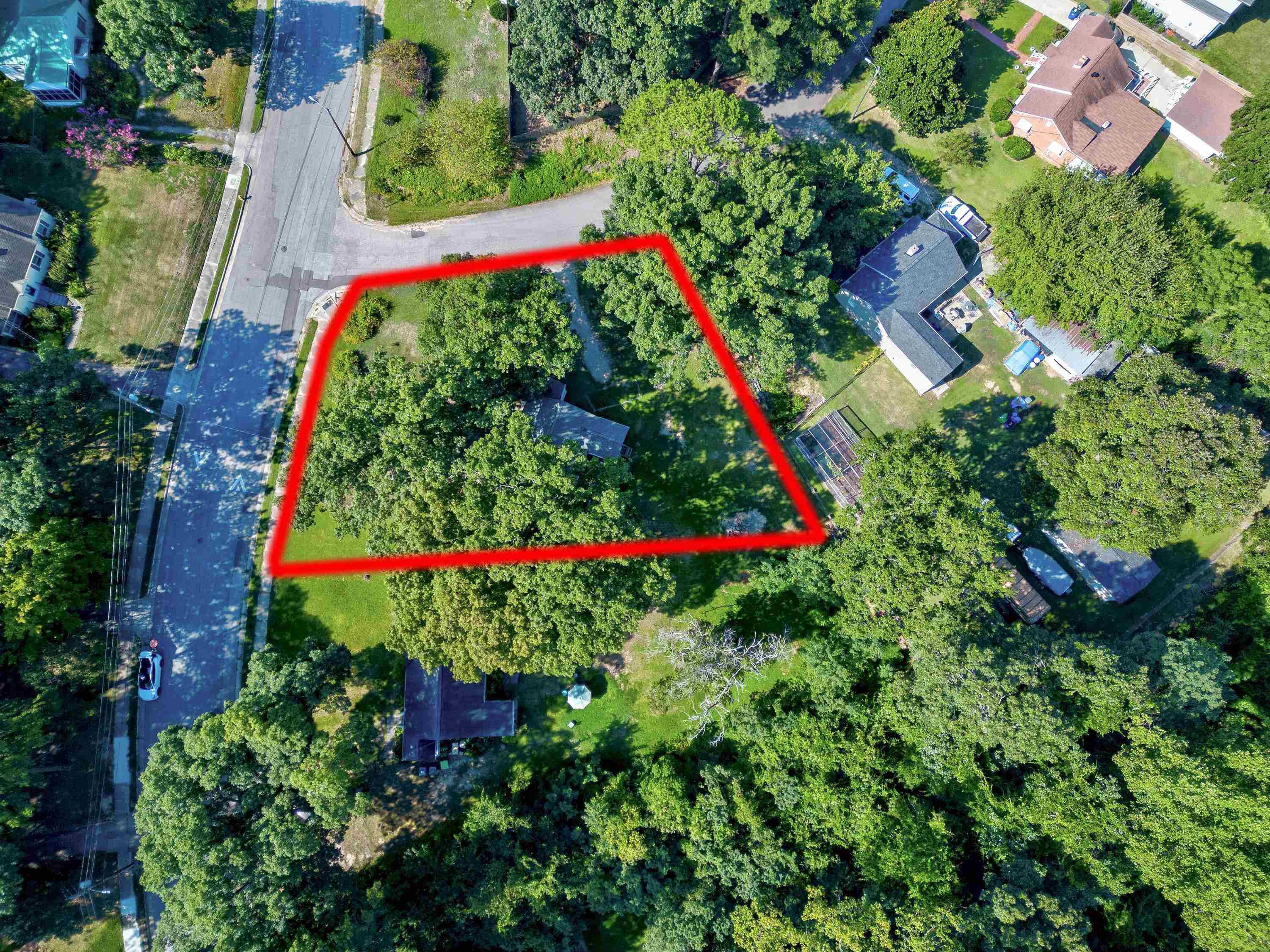 501 North King Charles Road Raleigh, NC 27610 - Photo 39 of 42 an aerial view of a flower garden