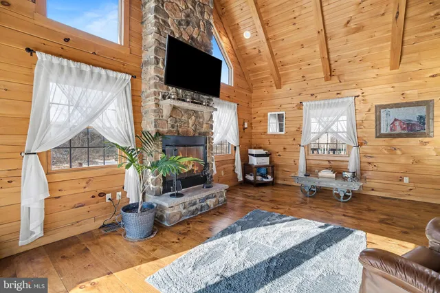 a view of a chairs and table on the deck