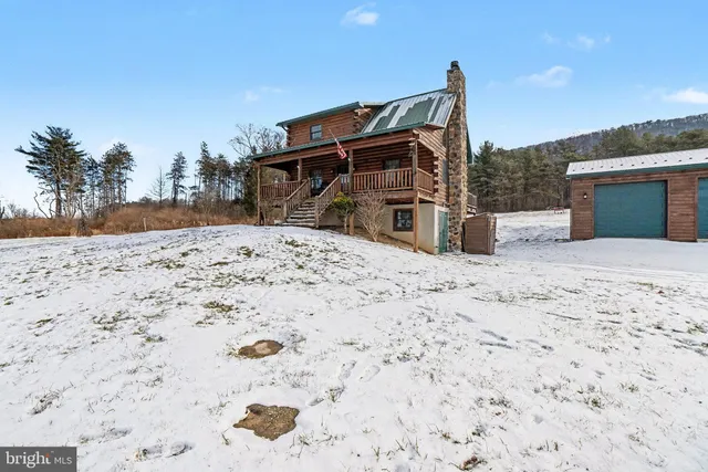 a view of a lake with a building in the background