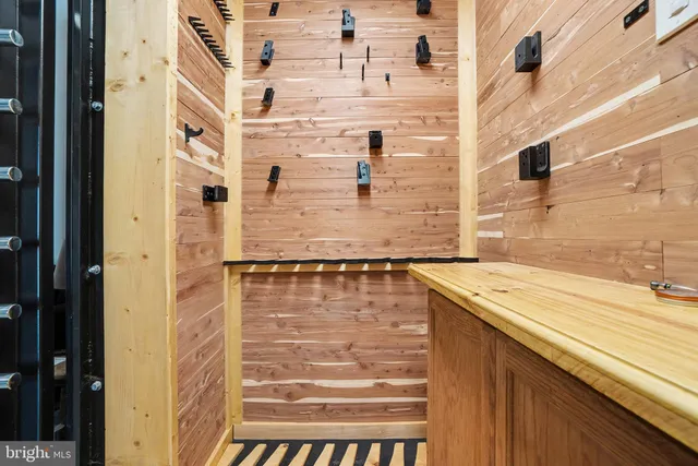 a balcony with trees in front of it