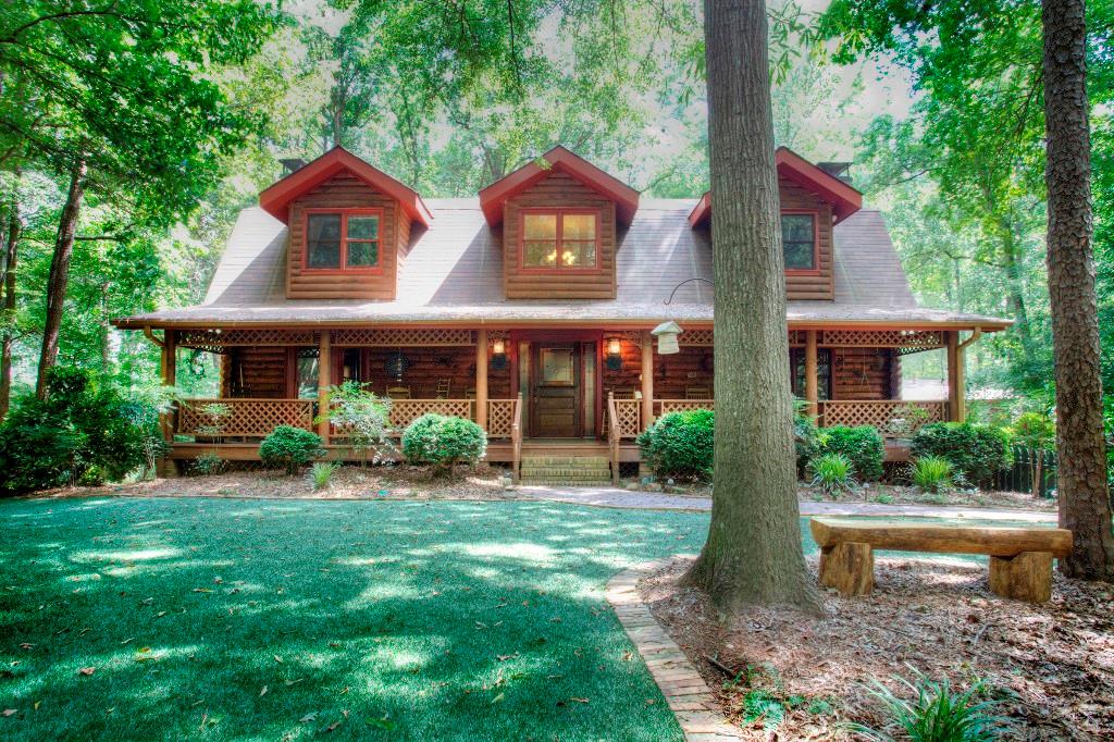 6099 Pattillo Way Lithonia, GA 30058 - Photo 1 of 1 Beautifully unique log home with extra large front porch.