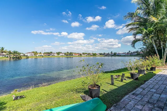 a outdoor living space with furniture and a potted plant