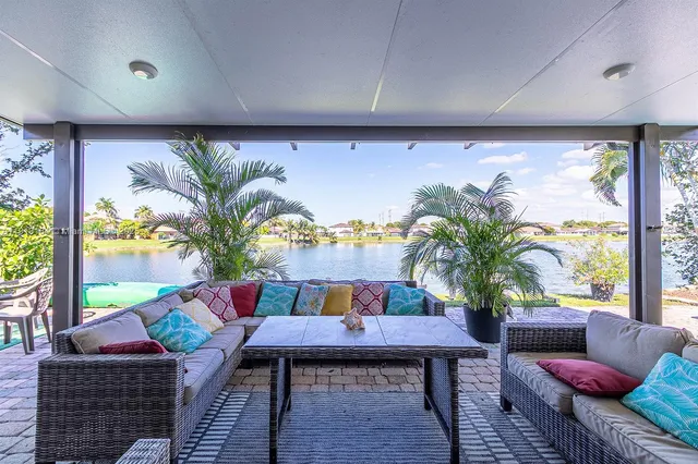 a outdoor living space with furniture and a potted plant