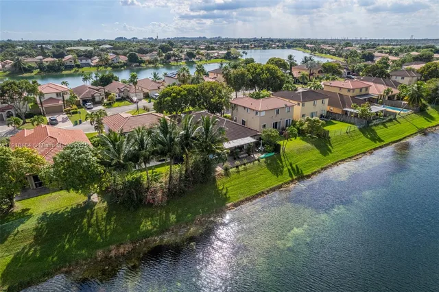 a view of balcony with wooden floor and fence