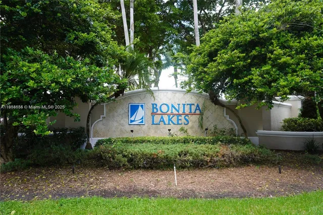 a view of a swimming pool with lounge chair