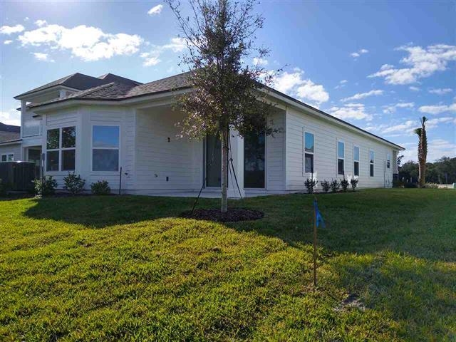 55 St Barts Avenue St. Augustine, FL 32080 - Photo 15 of 20 a view of a house with backyard and garden