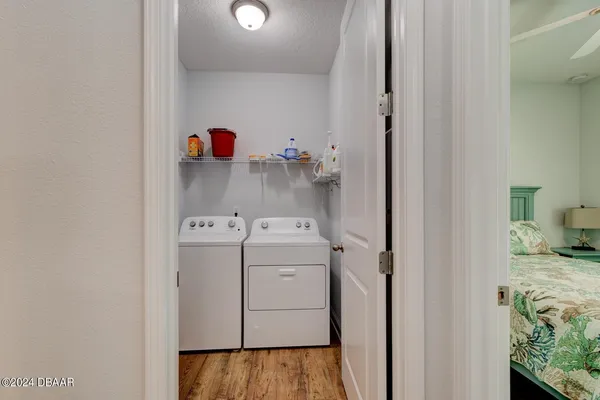 a bedroom with a bed and a table in it