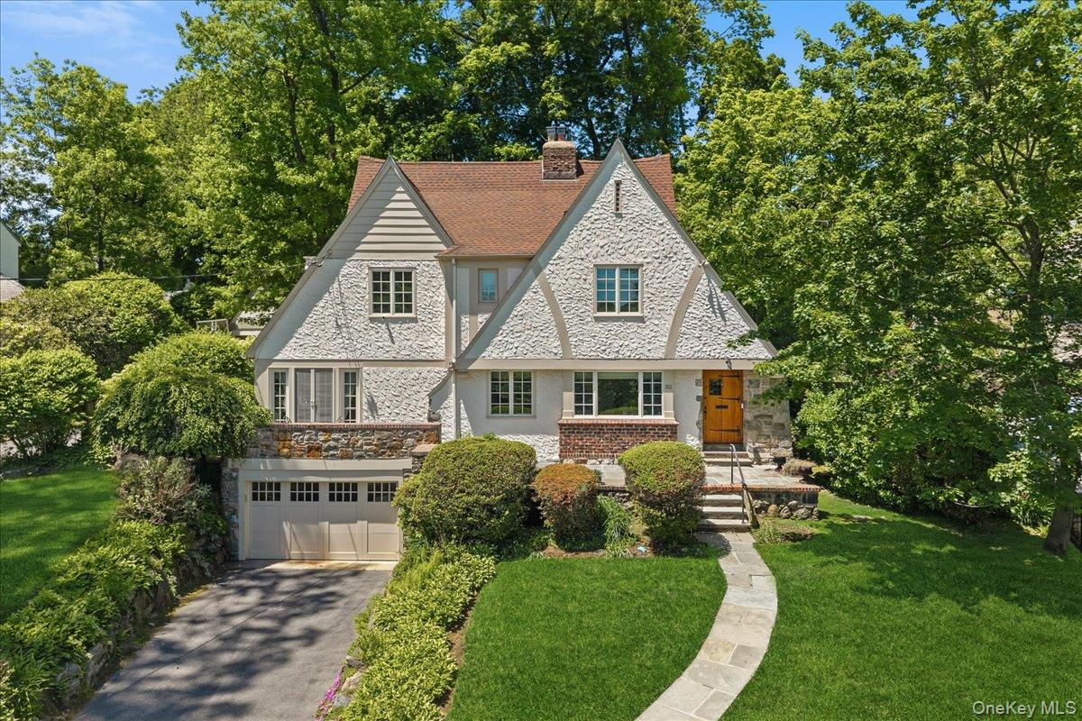 311 Lyncroft Road New Rochelle, NY 10804 - Photo 2 of 39 a aerial view of a house with a yard