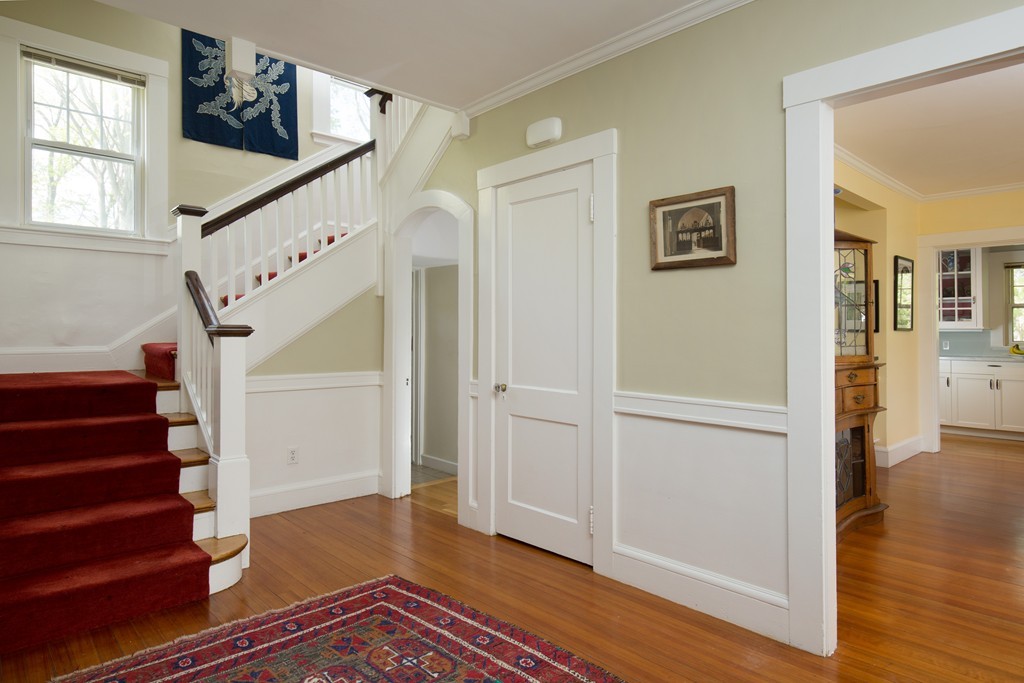 7 Homestead Road Wellesley, MA 02482 - Photo 3 of 10 a view of entryway with wooden floor and stairs